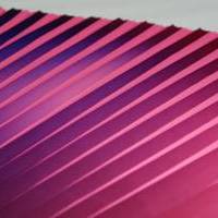 Machine pleating + printing on base colour fabric